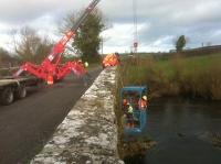 Mini Crane working on a bridge restoration project in Laois.