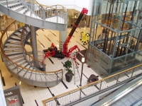Installing glass with a Mini Crane Spider Crane in an office block in Galway.