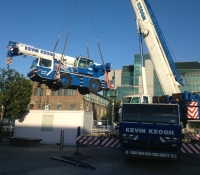 90 ton Faun lifted in the 40 ton Liebherr to the bed of the basin